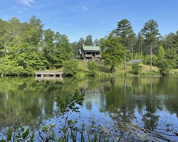Large Tract with Off-Grid Accommodations, River Frontage